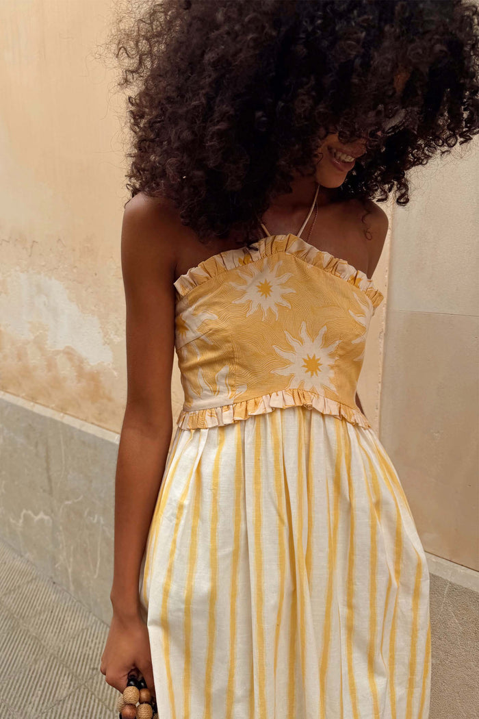 NFD Yellow Stripe Ashley Dress with sun motifs and a ruffled bandeau bodice in a cotton-linen blend.